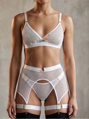 white mesh garter belt (also known as a suspender belt)with a modern, cage-style